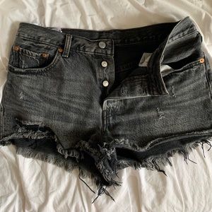 Ripped black denim shorts